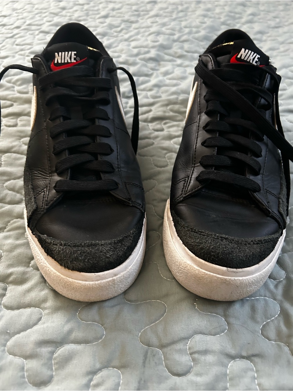 Nike Black Leather Low-Top Sneakers with White Soles and Red Logo